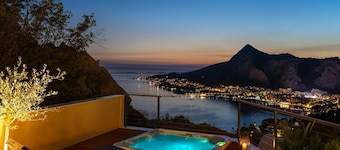 Villa Casa Vita featuring a sea view, billiards, and heated pool