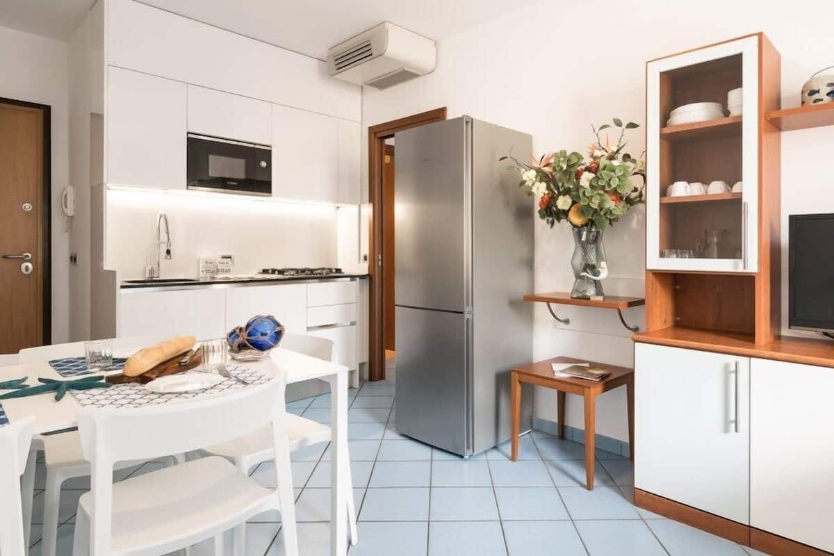 Family Apartment, 2 Bedrooms, Balcony | Living area | TV