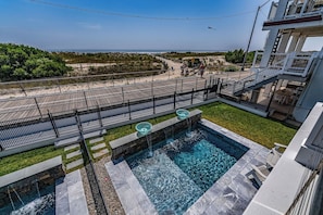 Outdoor pool, a heated pool - Top Level Luxury BeachFront on Boardwalk, Roof Deck, Pool & Elevator! 6BR/7BA! (Ocean City)