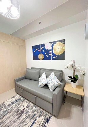 Smart TV - Fresh Cool 1BR place at Grass Tower2 16th floor (Quezon City)