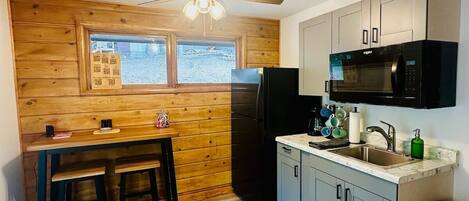 Fridge, microwave, coffee/tea maker, toaster