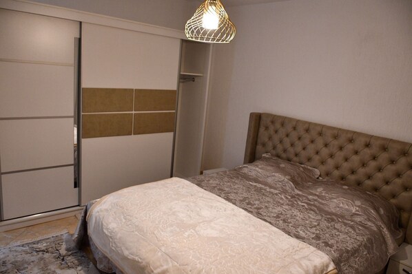 2 dormitorios, tabla de planchar con plancha, wifi y ropa de cama