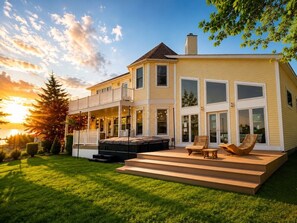 A two-story house with a covered patio, a hot tub, and a pool. - Castleview Cove- 5Bd 4Ba Lakefront Luxury Retreat! (Port Sanilac)