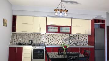 Réfrigérateur, four, cafetiÚre/bouilloire, grille-pain