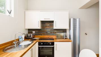 Refrigerador, microondas, horno y lavavajillas