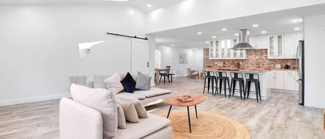 Smart TV, fireplace, table football, books