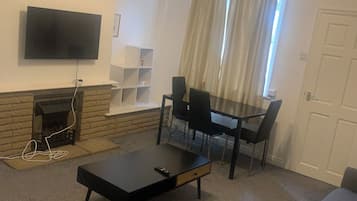 House | Living area | TV, fireplace