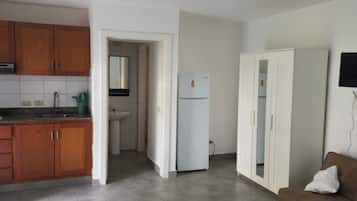 Estudio familiar, balcón | 1 habitación, caja de seguridad en la habitación y cortinas blackout