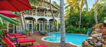 Experience laid-back luxury in our Cozy poolside studio  with beautiful gardens