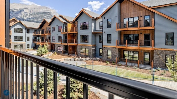 A modern multi-story residential building with balconies and large windows. - 2 Bed/2 Bath Sparrowhawk-Courtyard Facing-Sleeps 6 (Dead Man's Flats)