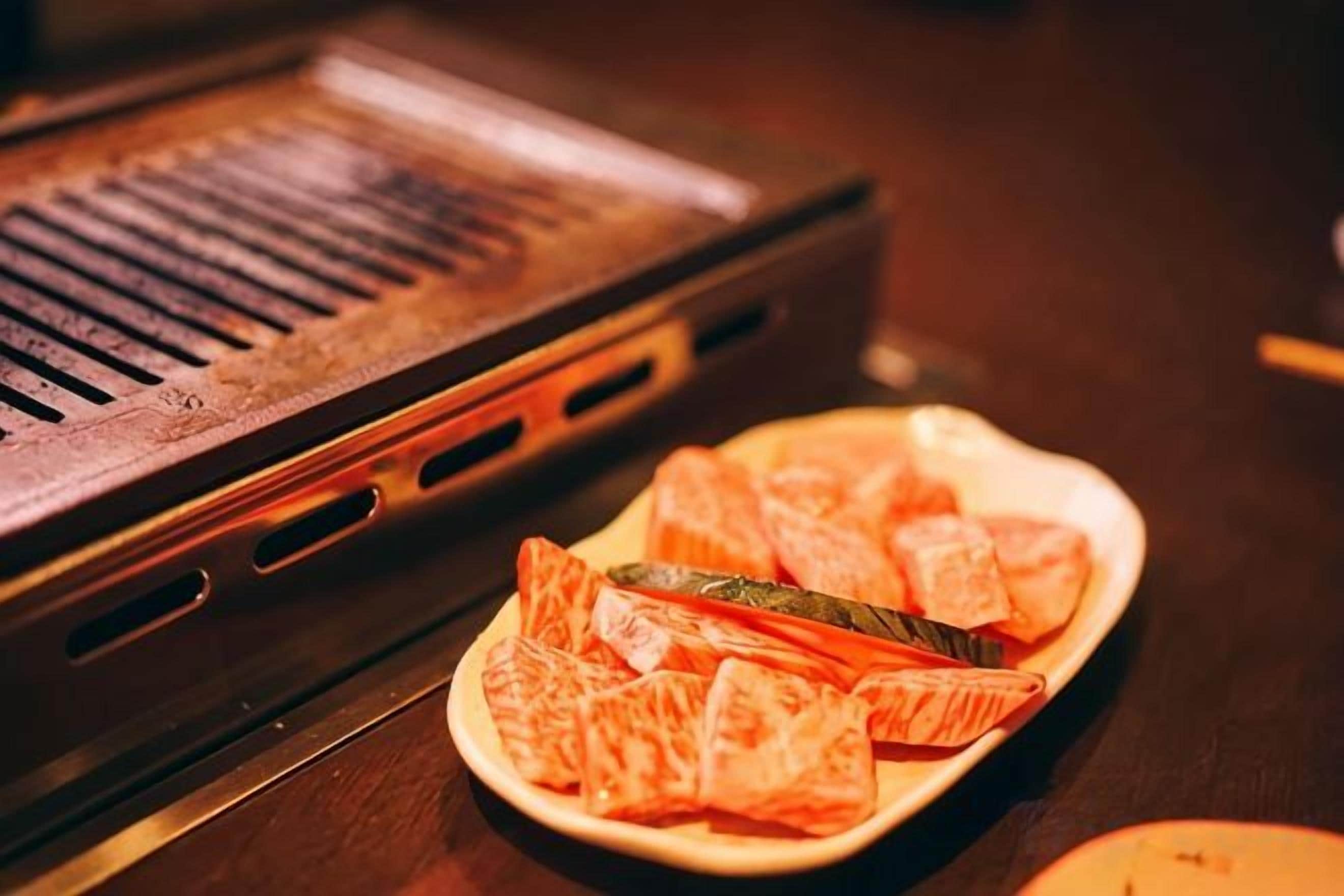 A grill with food on a plate.
