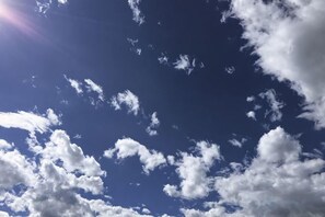 A clear sky with scattered clouds. - Beginner's Mind in Dali Art Theme Hotel (Dali City)