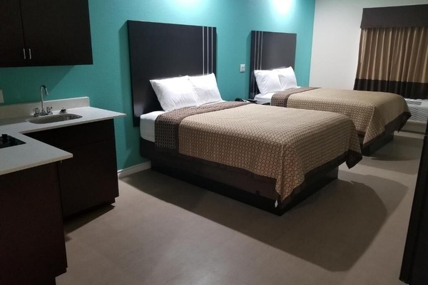 Unwind in a spacious double-room with handy kitchenette convenience.