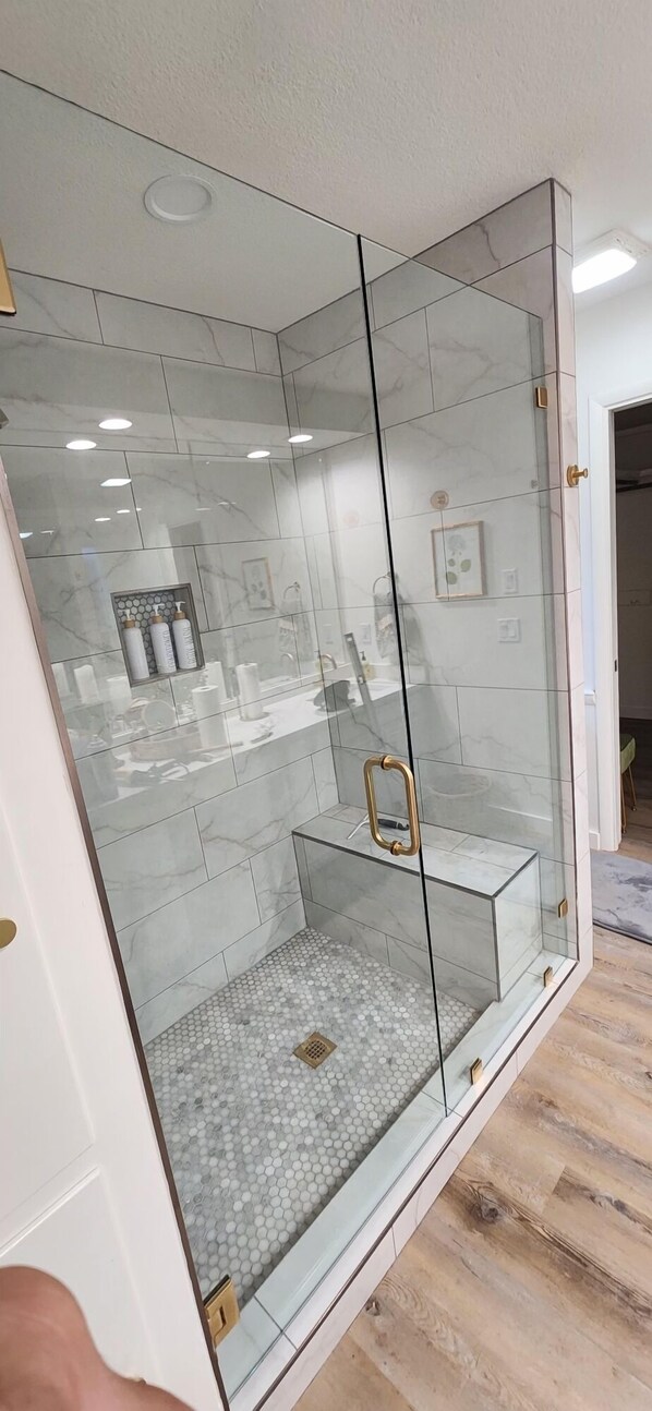 Shower, hair dryer, towels, soap