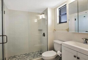 Shower, hair dryer, towels, soap