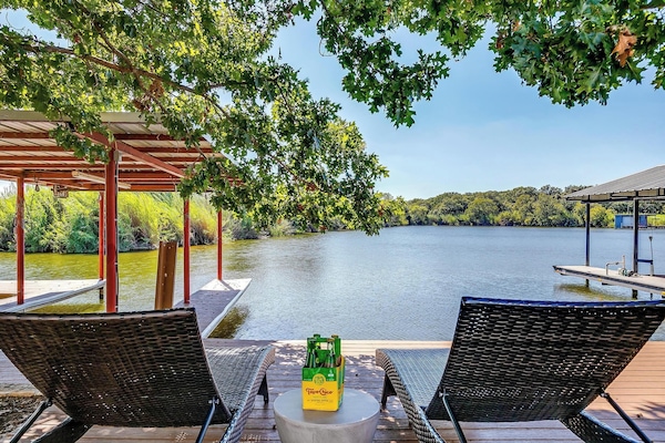Serenity awaits – enjoy lakefront views while relaxing on this peaceful dock.