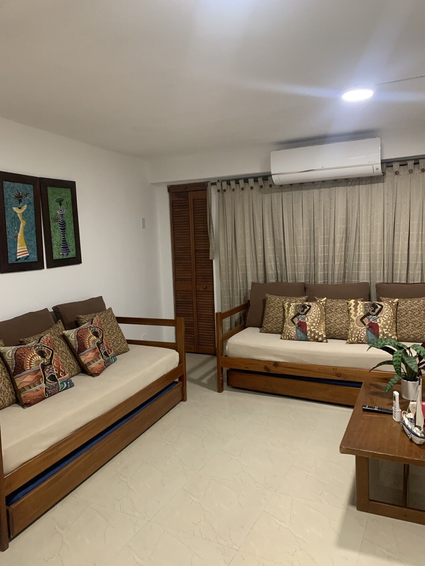 Family Apartment, Partial Sea View | Living area | Flat-screen TV