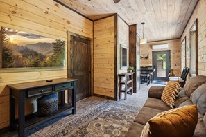 Smart TV, chimenea, videojuegos, mesa de ping pong