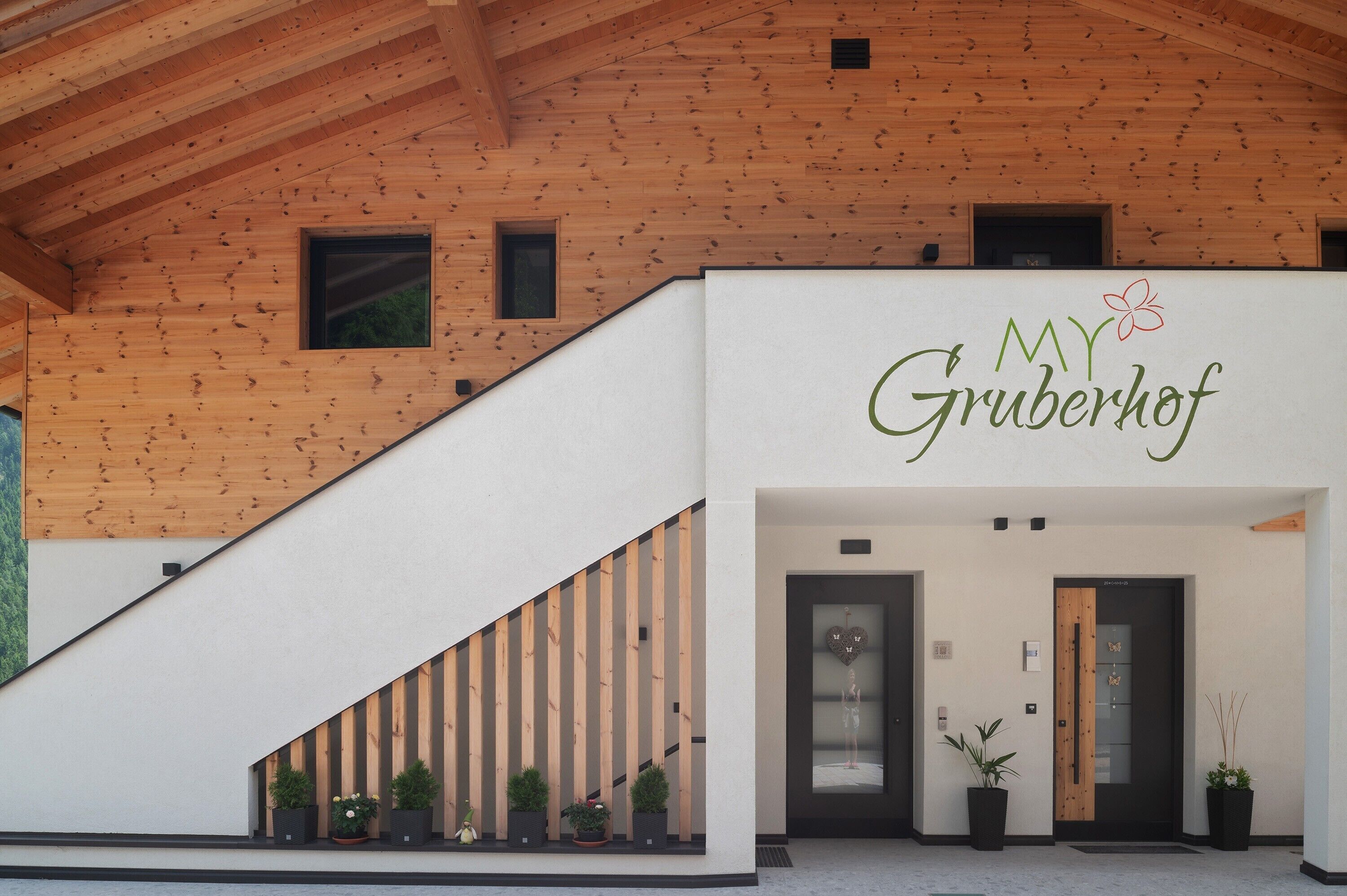 A building with a wooden interior and a white exterior.