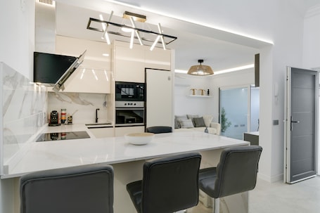 Fridge, microwave, oven, stovetop. Vacation Home 'Dúplex El Equilibrio' with Mountain View, Wi-Fi and Air Conditioning