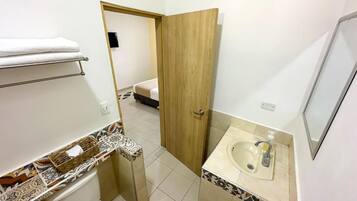 Basic Single Room, 1 Double Bed, Private Bathroom | Bathroom | Shower, free toiletries, towels, soap