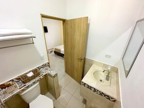 Basic Single Room, 1 Double Bed, Private Bathroom | Bathroom | Shower, free toiletries, towels, soap