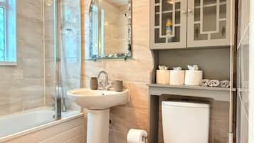 Hair dryer, towels, soap, shampoo