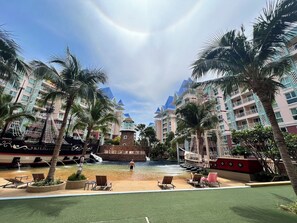 2 outdoor pools, open 7:30 AM to 8:30 PM, pool loungers - Grande Carribean Condo By Thita (Pattaya)