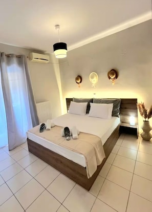 1 habitación, tabla de planchar con plancha, wifi gratis y ropa de cama
