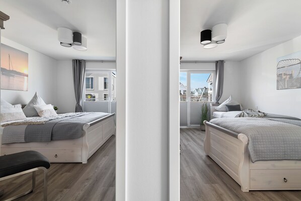 2 quartos, ferros/tábuas de passar roupa, berço de viagem