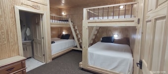 Spacious lodge with custom bunk rooms in prime Lake Area with ample parking.