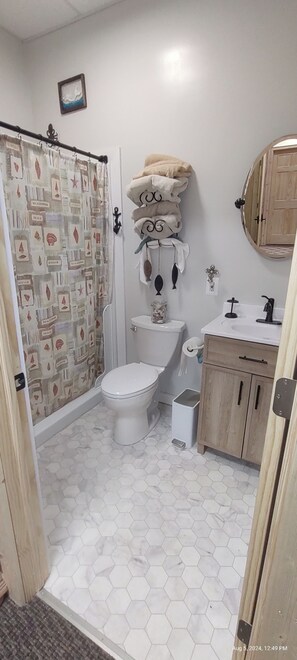 Hair dryer, towels, soap, shampoo