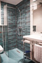 Shower, towels, soap, shampoo