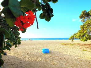 On the beach, sun loungers, beach towels