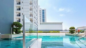 Outdoor pool - Luxurious 2-bedroom Apartment With Balcony in JVC (Dubai)