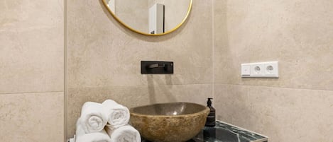 Hair dryer, towels, soap, shampoo