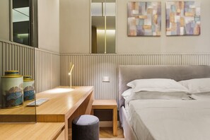 1 chambre, coffres-forts dans les chambres, fer et planche à repasser