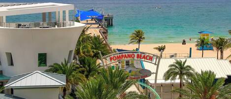 On the beach, sun loungers, beach towels