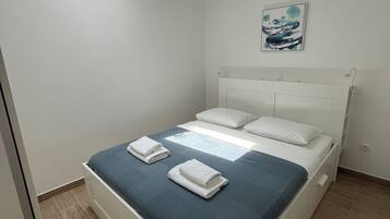 2 habitaciones, tabla de planchar con plancha y wifi gratis