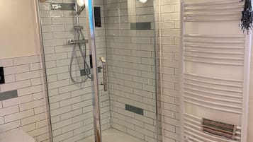 Shower, towels, soap, shampoo