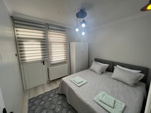 Quartos à prova de som, ferros/tábuas de passar roupa, Wi-Fi de cortesia
