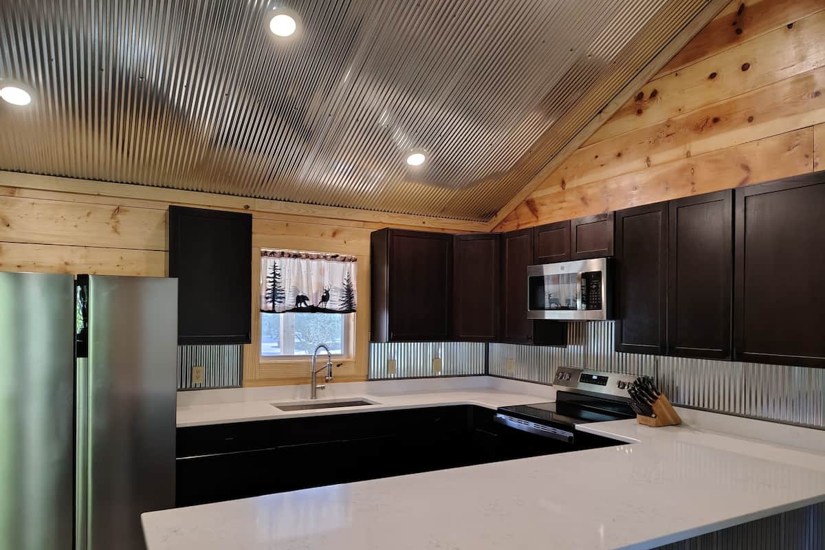 Deluxe Cabin, 2 Bedrooms, Mobility Accessible, Non Smoking | Private kitchen | Full-size fridge, microwave, oven, stovetop