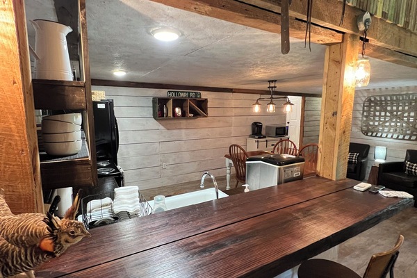 A bar that overlooks the kitchen