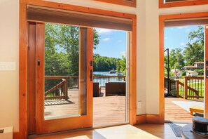 Enjoy a serene lakeside view from the comfort of your deck.