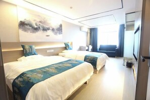 A hotel room with two beds, a large painting on the wall, and a view of the outdoors. - Qinyu Hotel (Haikou)