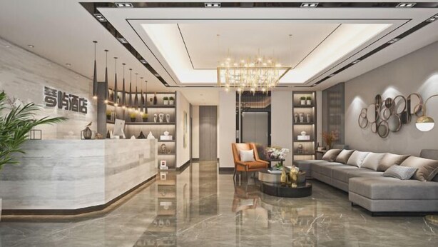 A modern hotel lobby with a reception desk, seating area, and decorative lighting. - Qinyu Hotel (Haikou)