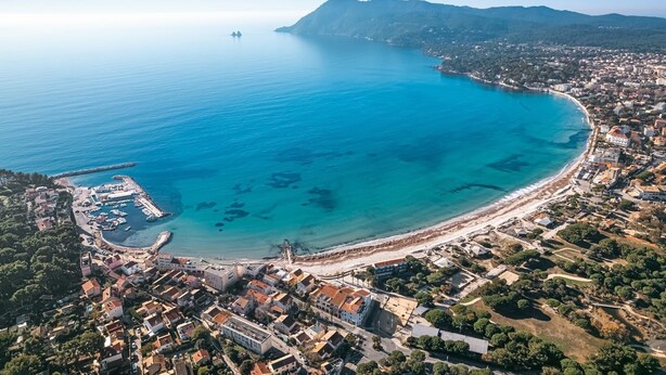 An aerial view of a coastal town with a marina, beach, and residential buildings. - Le Mas de Fabregas. Chambre Dhôte Calme et Tranquille à 400m de la mer (La Seyne-sur-Mer)