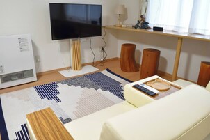 Apartamento superior | 2 quartos, escrivaninha, Wi-Fi de cortesia, roupa de cama