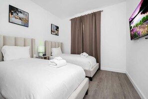 4 habitaciones, tabla de planchar con plancha y wifi gratis 