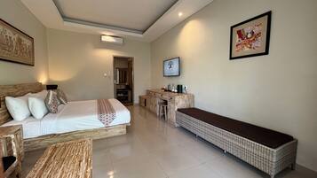 Quarto casal premium, vista para a piscina | Frigobar, Wi-Fi de cortesia, roupa de cama
